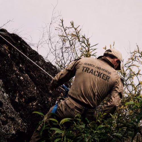 Search and rescue tracker descends mountain