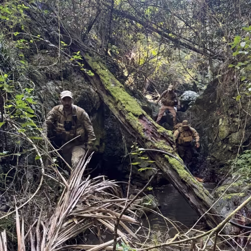Trackers traverse challenging terrain